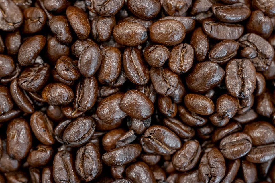 Roasted coffee beans filling the frame