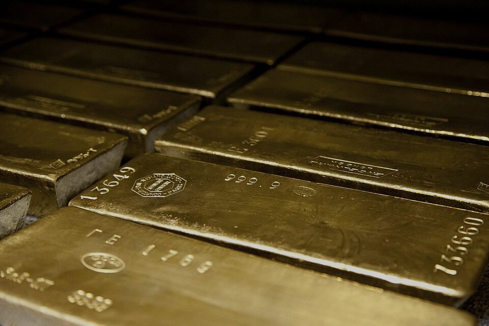 Stacked 400-ounce gold bars photographed close up