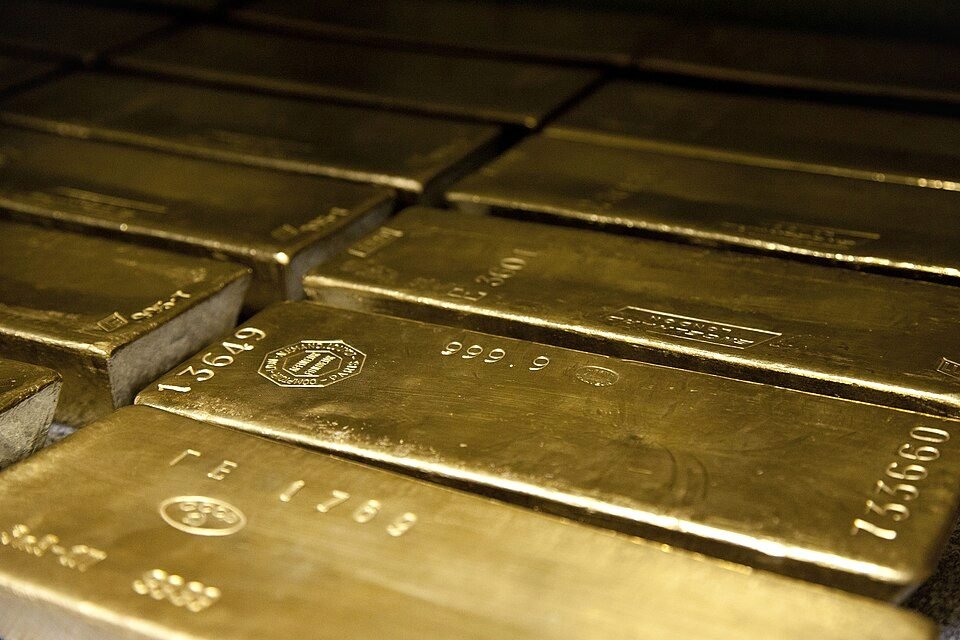 Stacked 400-ounce gold bars photographed close up